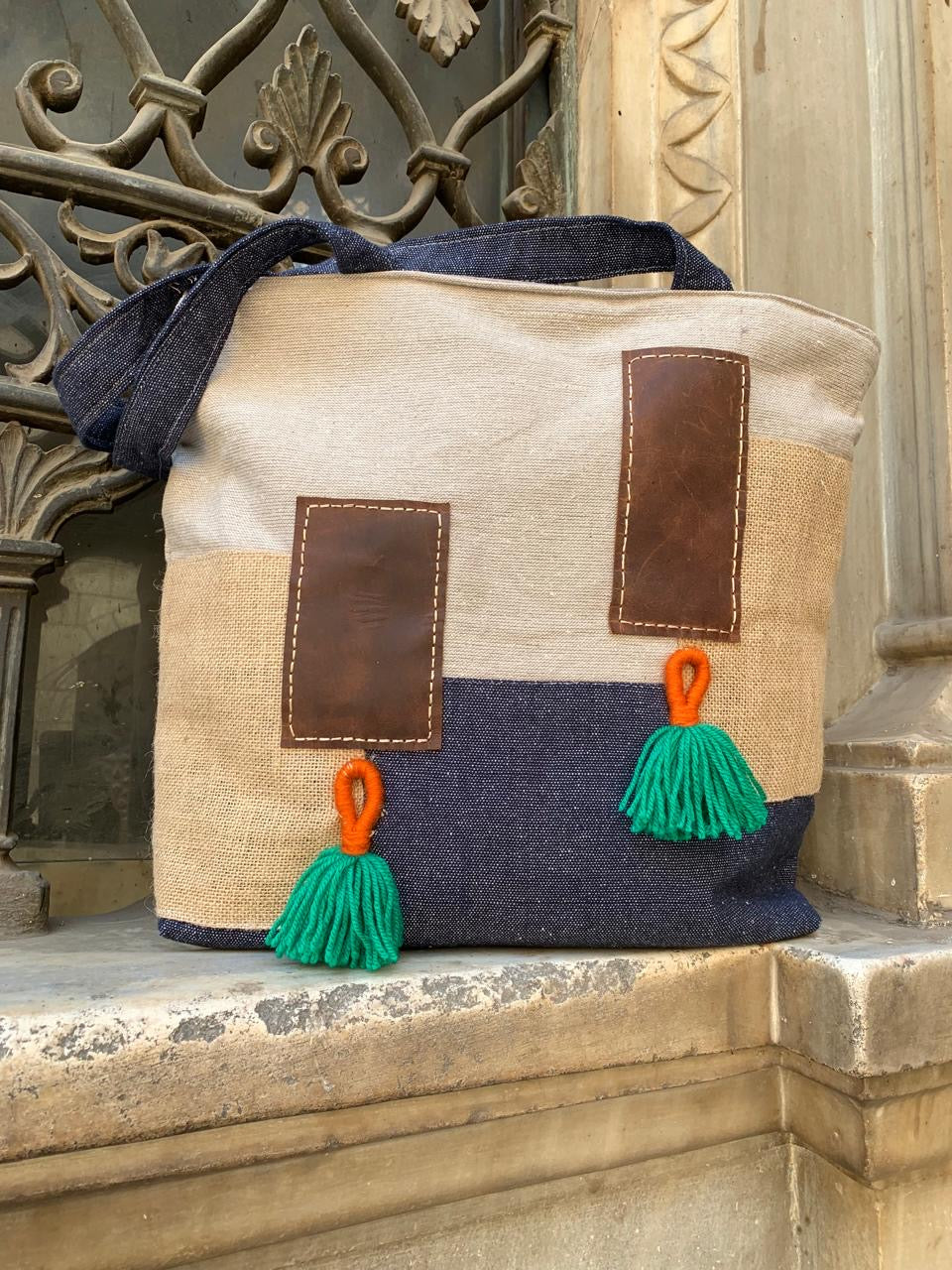 Two leather patch shoulder bag