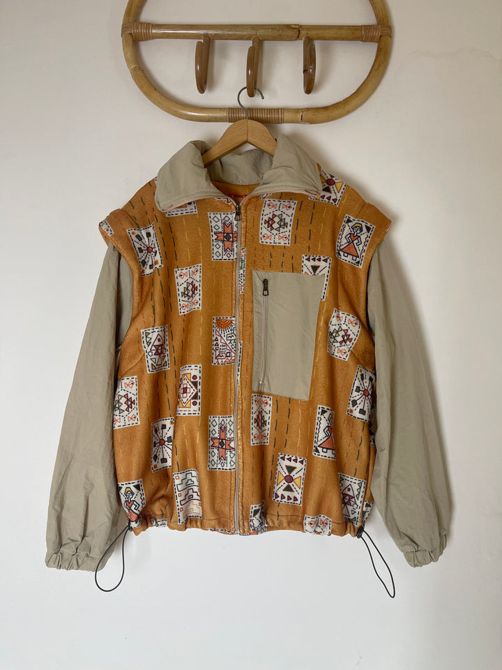 Embroidery stitches yellow jacket/vest