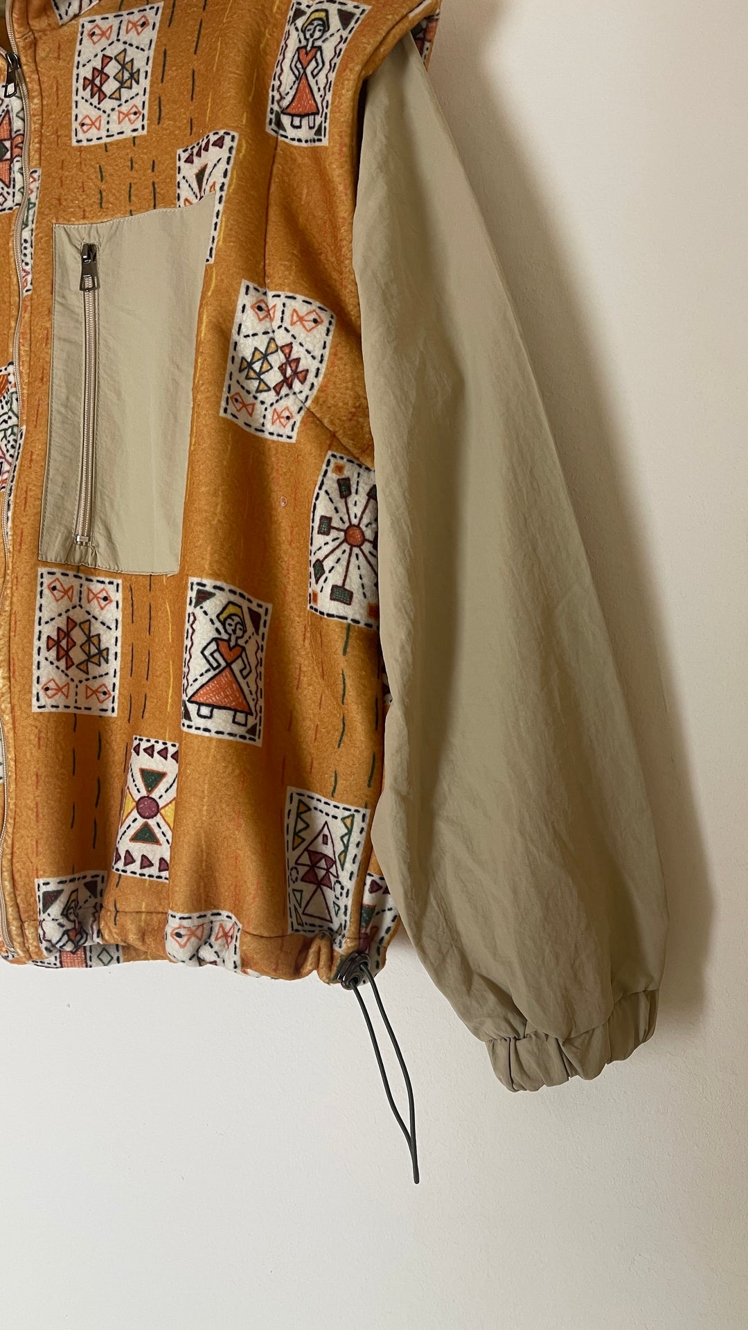 Embroidery stitches yellow jacket/vest
