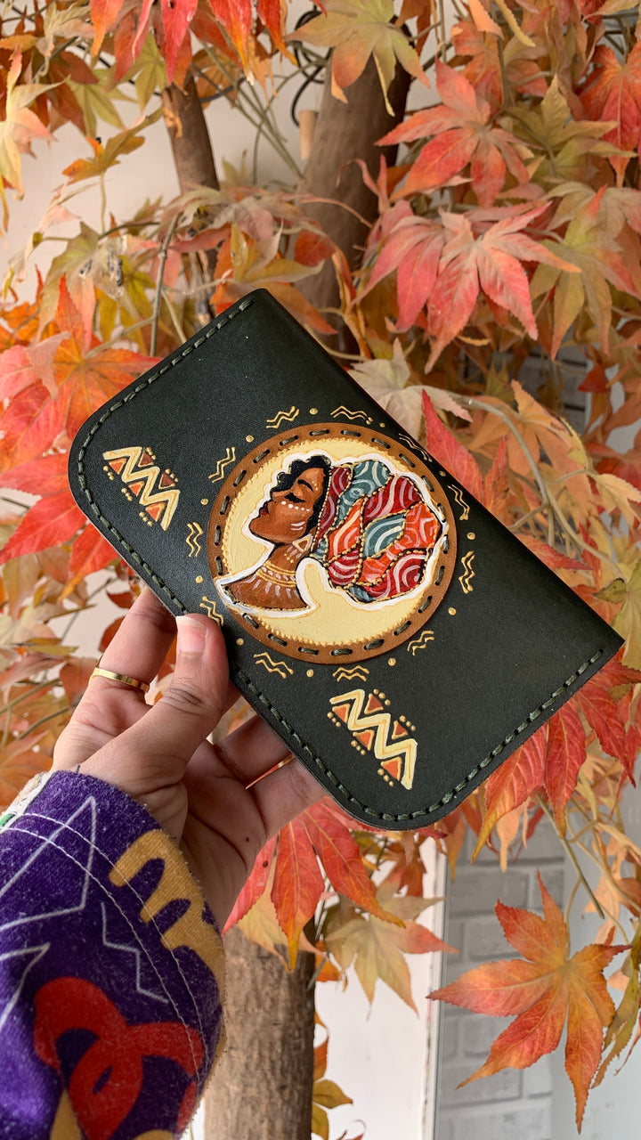 The Afro lady in dark Leather wallet
