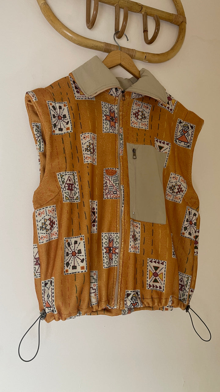 Embroidery stitches yellow jacket/vest