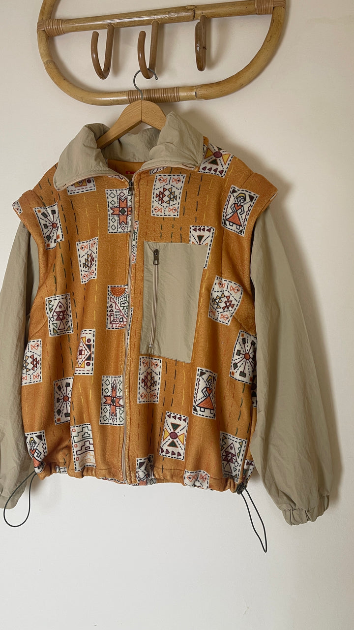 Embroidery stitches yellow jacket/vest