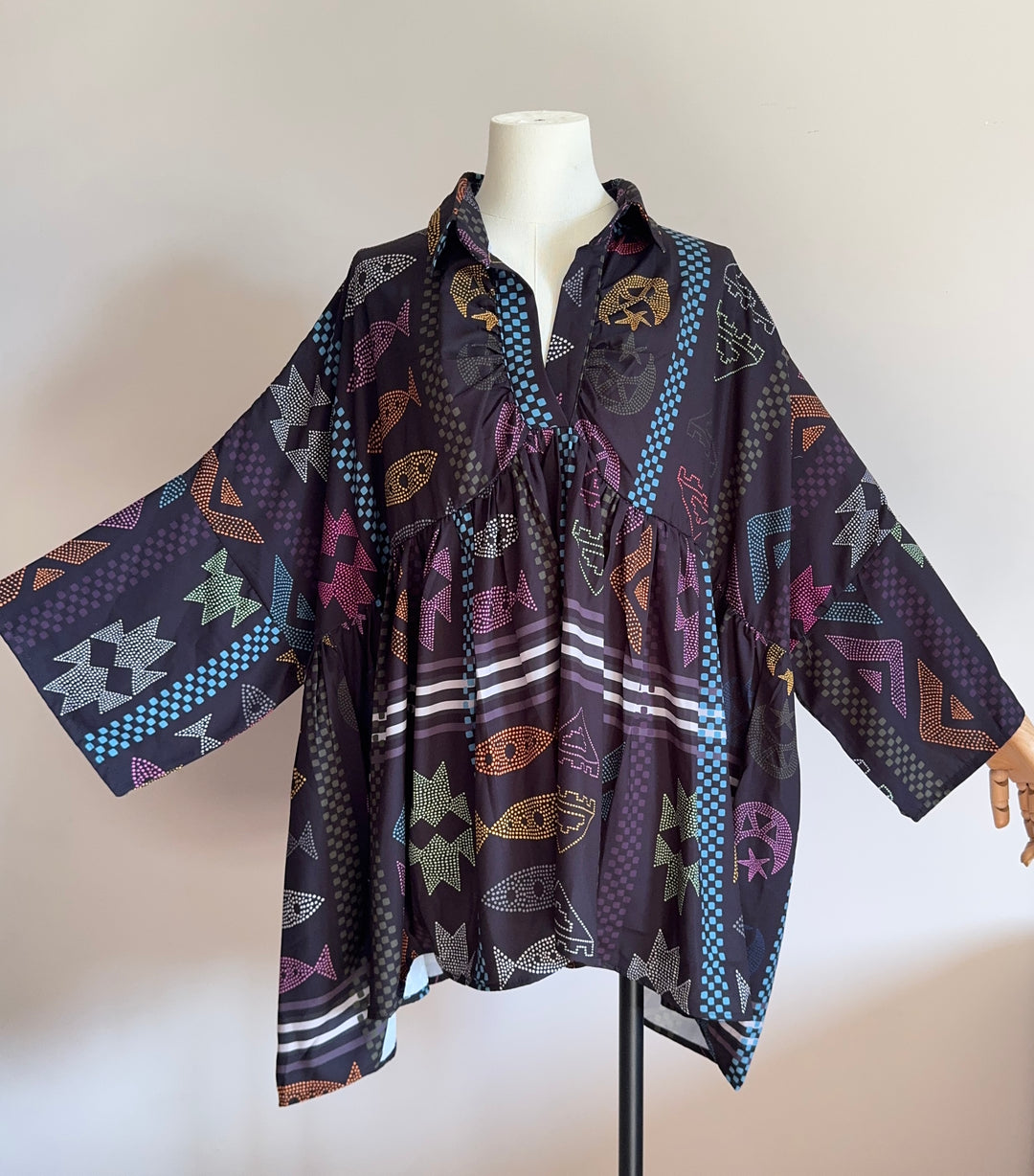 Triple mosaic poncho blouse