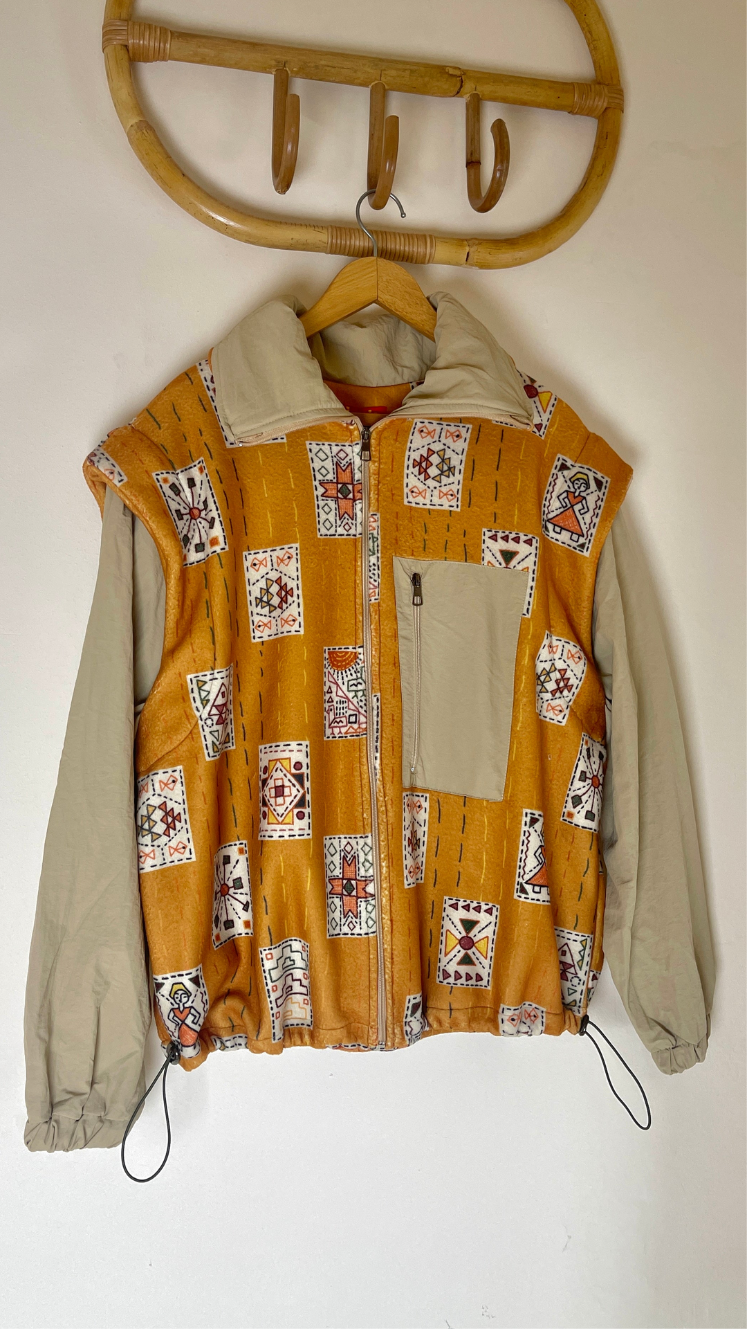 Embroidery stitches yellow jacket/vest