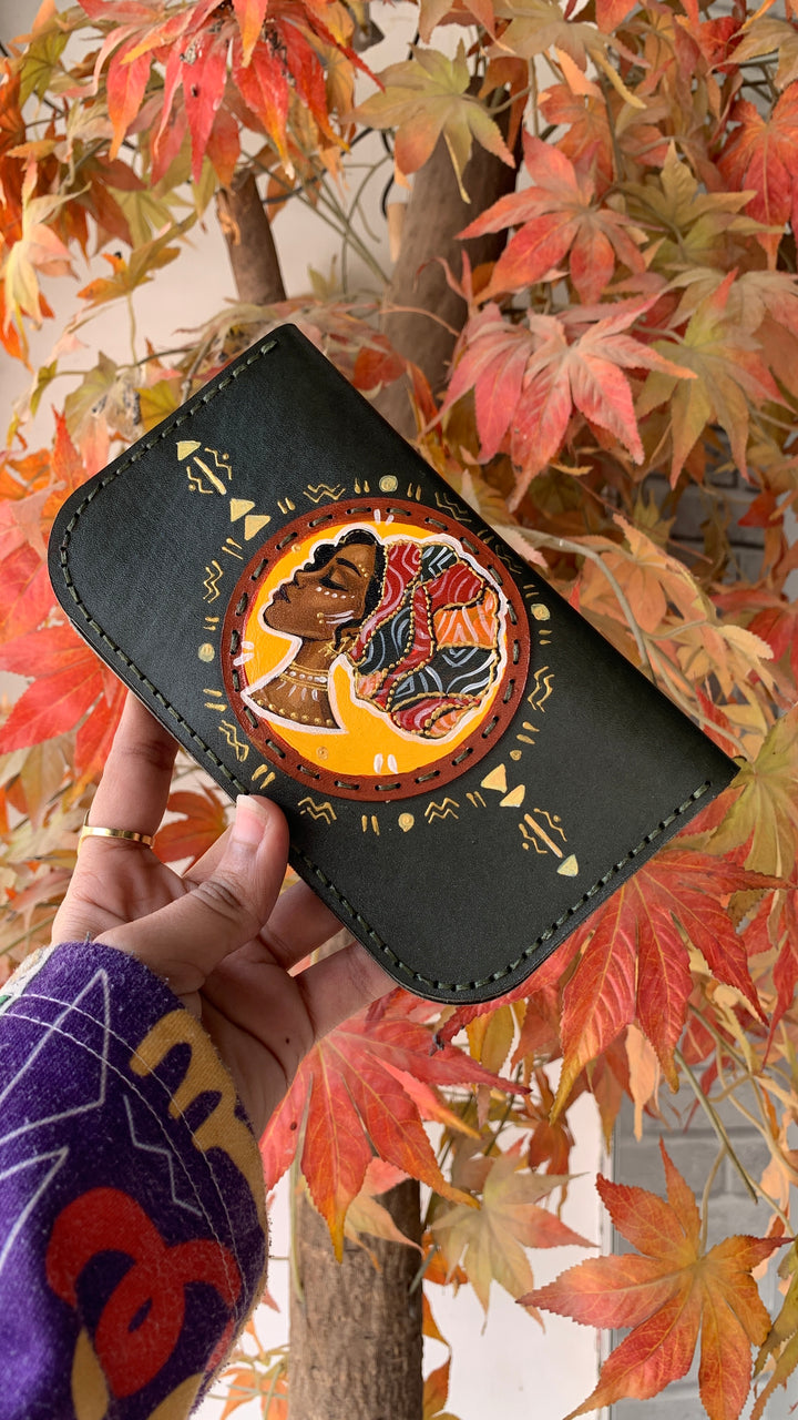 The Afro lady in dark Leather wallet