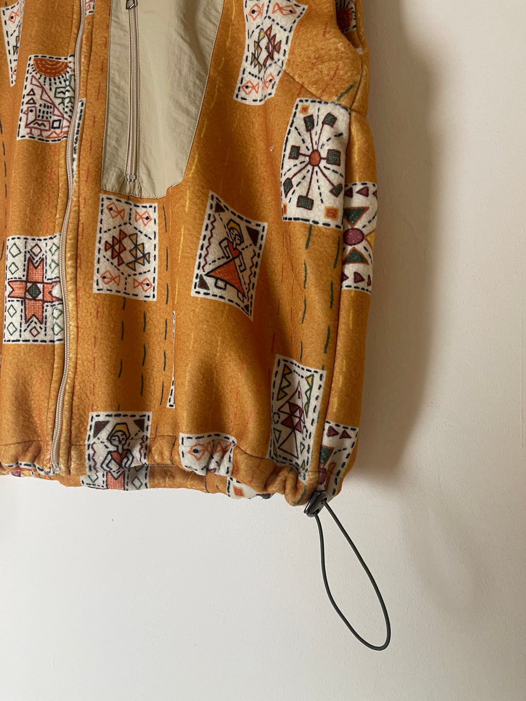 Embroidery stitches yellow jacket/vest