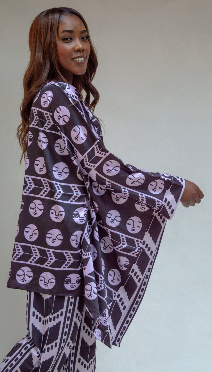 Black faces poncho