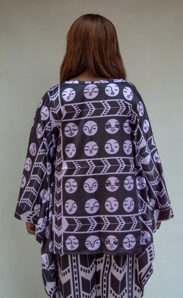 Black faces poncho