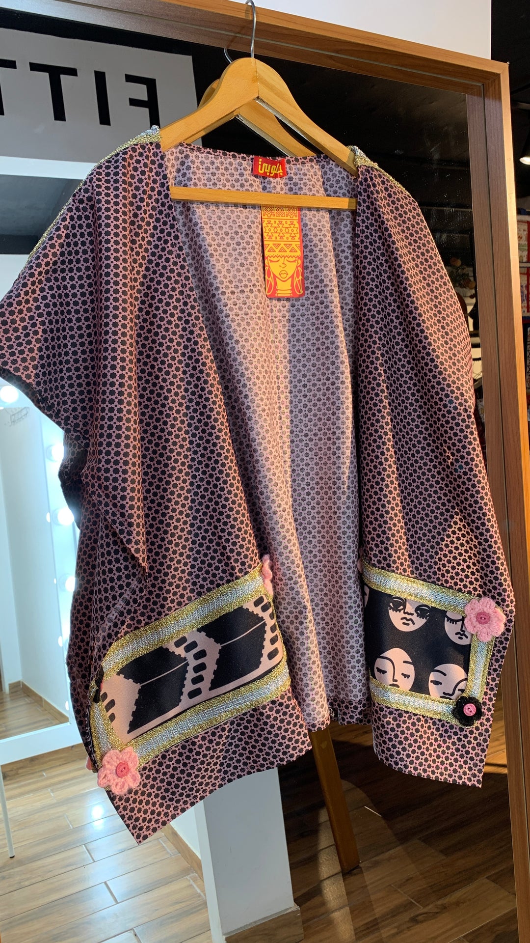 Black patchwork poncho