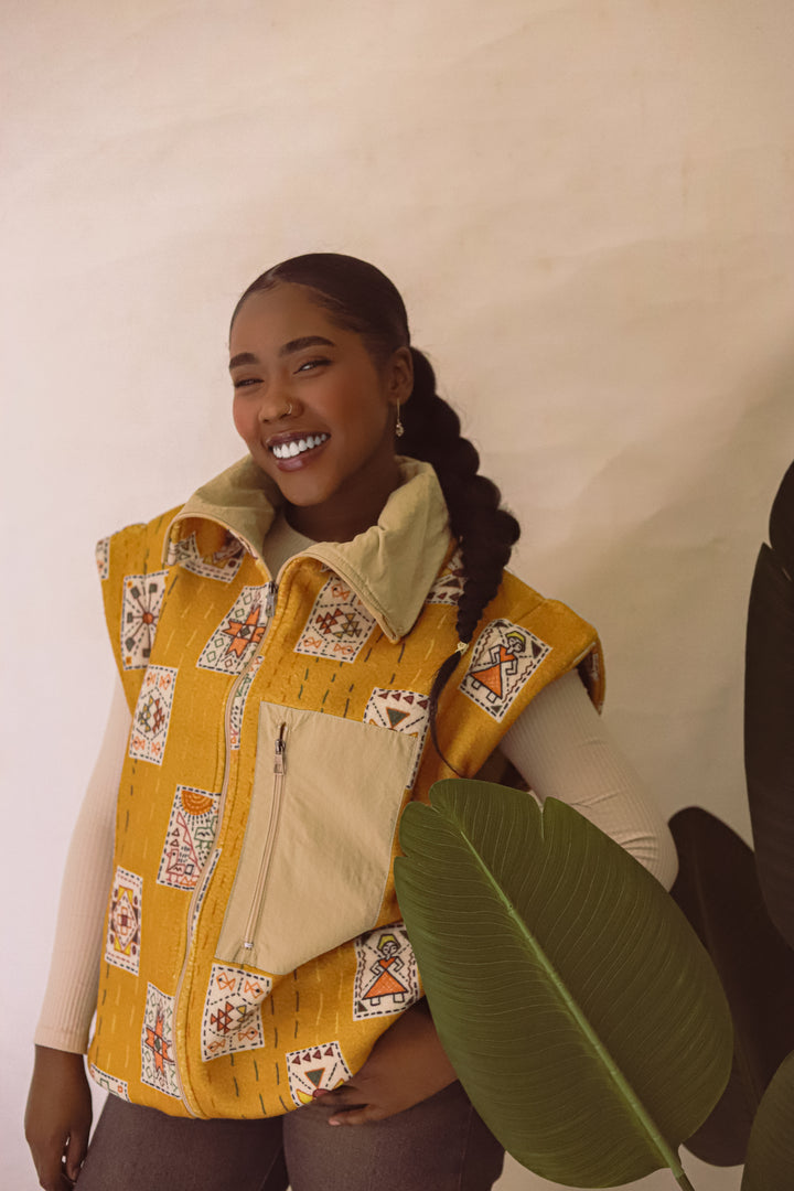 Embroidery stitches yellow jacket/vest