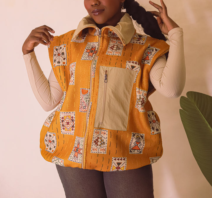 Embroidery stitches yellow jacket/vest