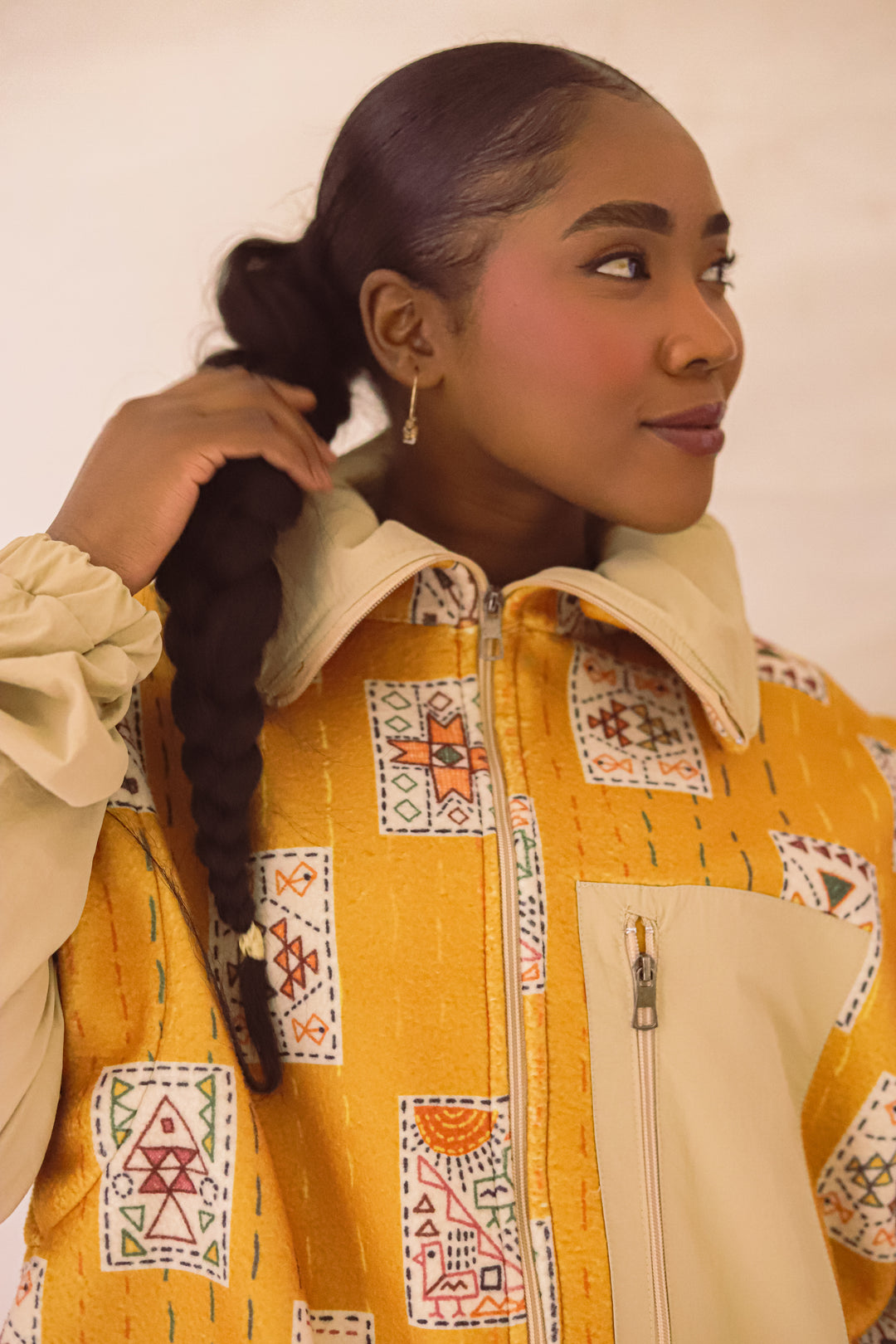 Embroidery stitches yellow jacket/vest