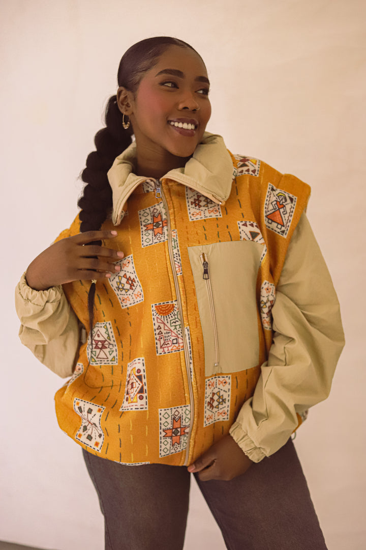 Embroidery stitches yellow jacket/vest